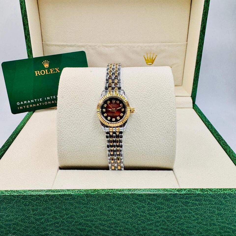 ساعة رولكس نسائية ذات إطار دائري بلون أحمر مينا أحمر صغير (رولكس).