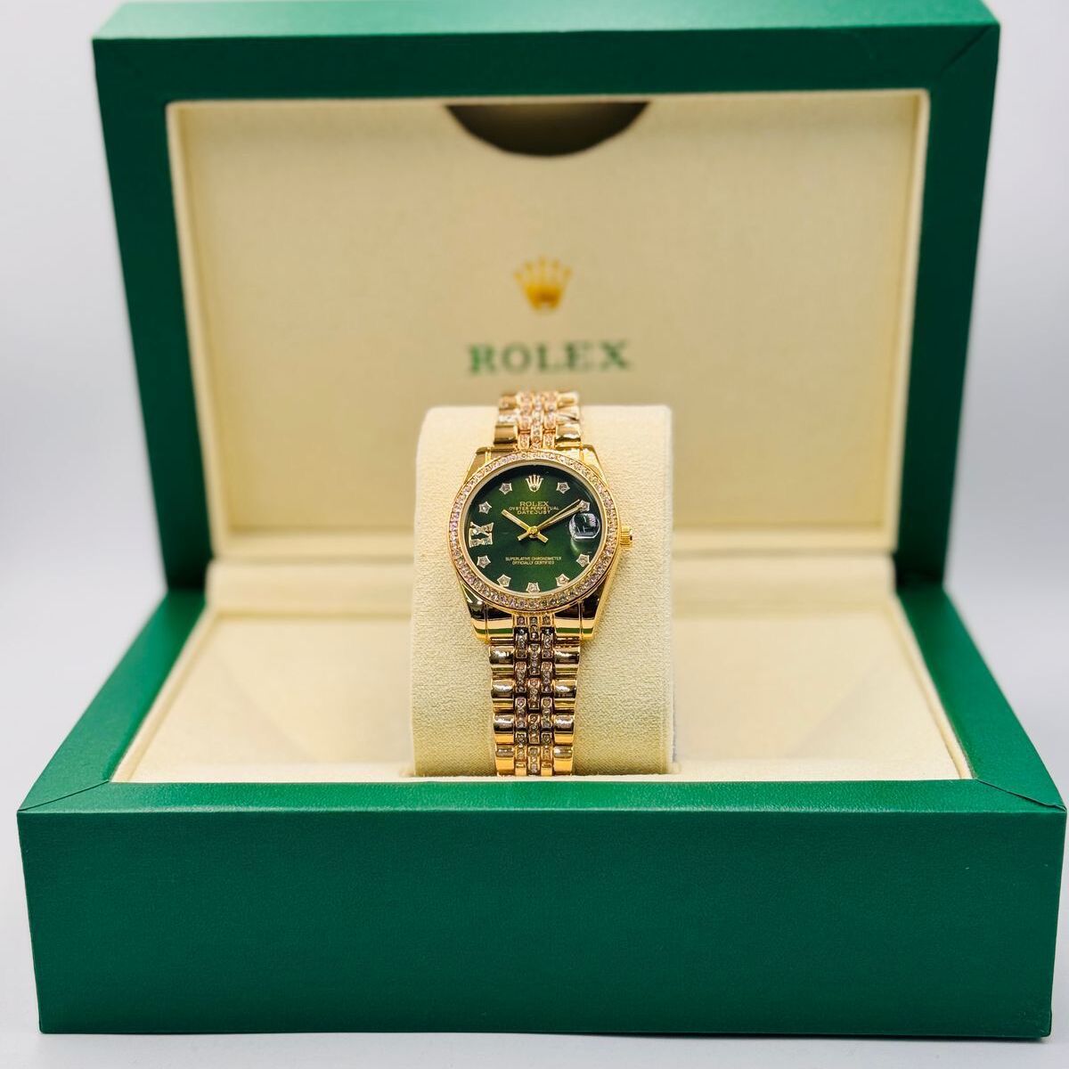 ساعة رولكس ديت جست نسائية فاخرة باللون الاخضر روز قولد بمينا زمردي مرصع