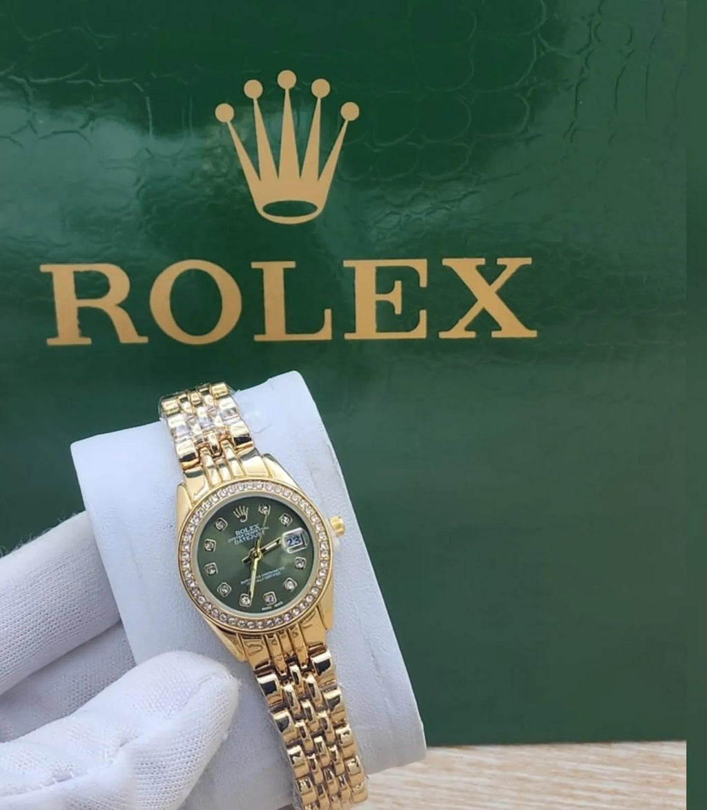 ساعة رولكس نسائية شفافة بالكامل بمينا خضراء زمردي صغير (رولكس).